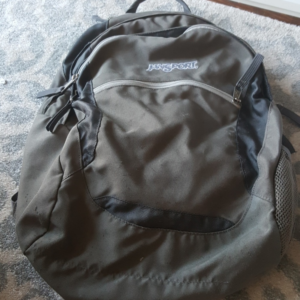 Time tested Jansport a gray and gray/green color.